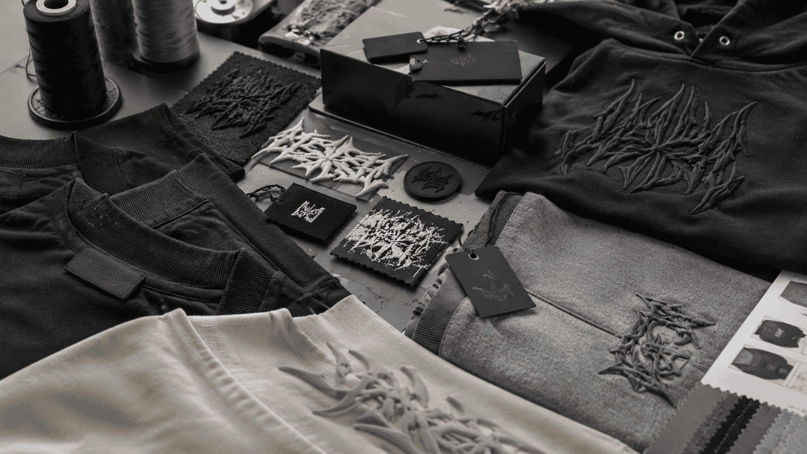 Close-up of premium streetwear customization including puff print, embroidery, heavyweight cotton fabric and woven labels